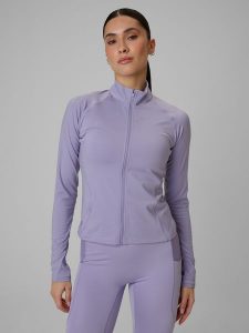 4F Bluza treningowa slim szybkoschnąca damska - fioletowa S. Fioletowe bluzy 4f, s, bez wzorów, ze skóry, bez kaptura. Za 179,99 zł.