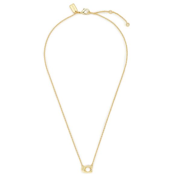 Zestaw naszyjnik i kolczyki Coach. Żółte naszyjniki Coach, złote. Za 319,99 zł.