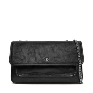 Torebka Calvin Klein Jeans. Czarne torebki klasyczne Calvin Klein Jeans, bez wzorów, z jeansu, bez dodatków. Za 349,99 zł.