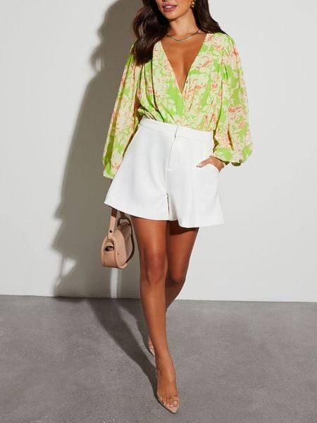 Milan Kiss Bluzka w kolorze zielono-kremowym rozmiar: XL. Zielone bluzki Milan Kiss, xl, bez wzorów, bez kołnierzyka, bez ramiączek. Za 135,17 zł.