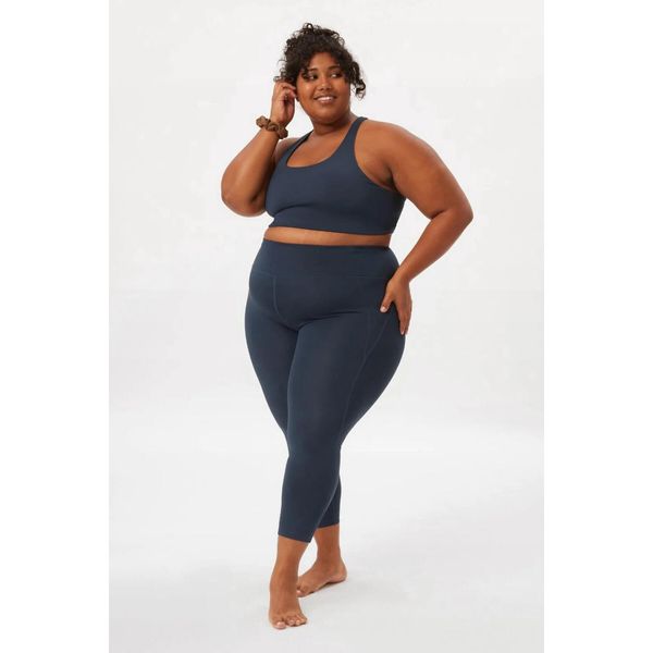 Damskie legginsy Girlfriend Collective Compressive High-Rise. Niebieskie legginsy GIRLFRIEND COLLECTIVE, bez wzorów. Za 389,50 zł.