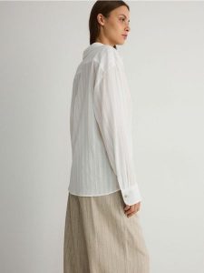 Koszula oversize z bawełny - złamana biel. Koszule Reserved, l, bez wzorów, z bawełny, bez kołnierzyka, bez ramiączek. W wyprzedaży za 39,99 zł.