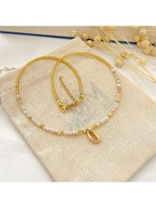 Atelier MIU Pozłacany naszyjnik - dł. 38 cm rozmiar: onesize. Brązowe naszyjniki Atelier MIU, z perłą, pozłacane. Za 30,99 zł.