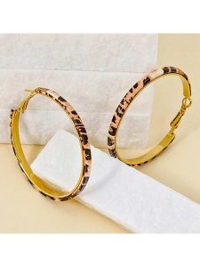 LA CHIQUITA Pozłacane kolczyki-kreole "My Leo" rozmiar: onesize. Żółte kolczyki LA CHIQUITA, pozłacane. Za 96,45 zł.