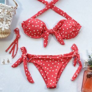 Bikini bez ramiączek w kropki na plażę i basen Phyliss. Czarne bikini Intica, bez wzorów. Za 129,00 zł.