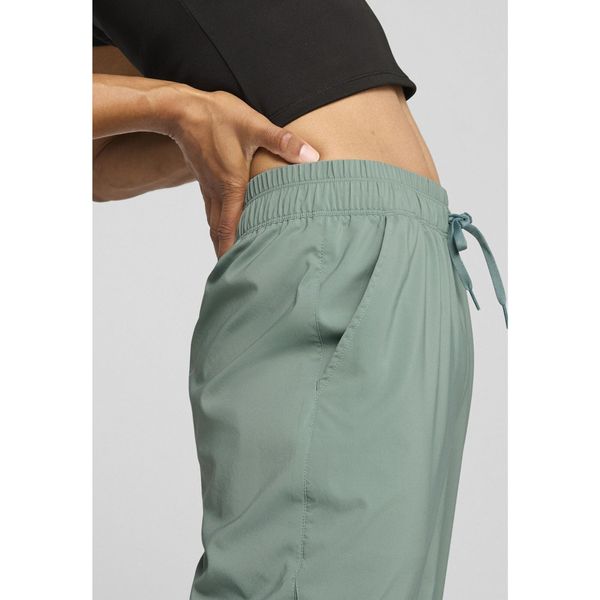 Damskie spodnie LACE PUMA Green Moon. Zielone spodnie sportowe Puma, l, bez wzorów, z podwyższonym stanem, na jogę i pilates. Za 249,10 zł.