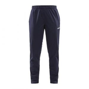 Spodnie sportowe damskie Craft Squad. Niebieskie spodnie dresowe Craft, bez wzorów, z materiału. Za 162,00 zł.