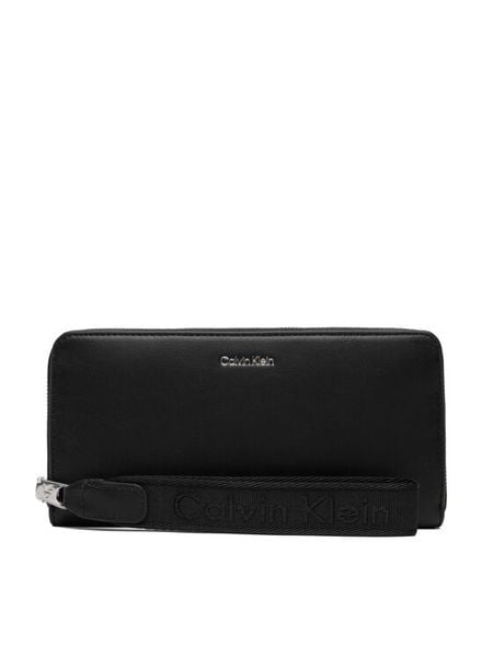 Calvin Klein Portfel Webbing Strap Long Zip Around LV04F1174G Czarny. Czarne portfele Calvin Klein, bez wzorów, ze skóry. Za 289,99 zł.