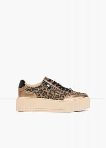 Sneakersy marki Marco Tozzi w panterkę. Żółte buty sportowe bonprix, bez wzorów, bez zapięcia. Za 249,99 zł.