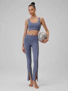 4F Legginsy do jogi szybkoschnące damskie - niebieskie S. Niebieskie legginsy 4f, bez wzorów, z podwyższonym stanem, długie. Za 169,99 zł.