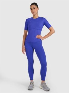 4F Legginsy treningowe szybkoschnące damskie - granatowe L. Niebieskie legginsy 4f, bez wzorów, z dzianiny, z podwyższonym stanem. Za 169,99 zł.