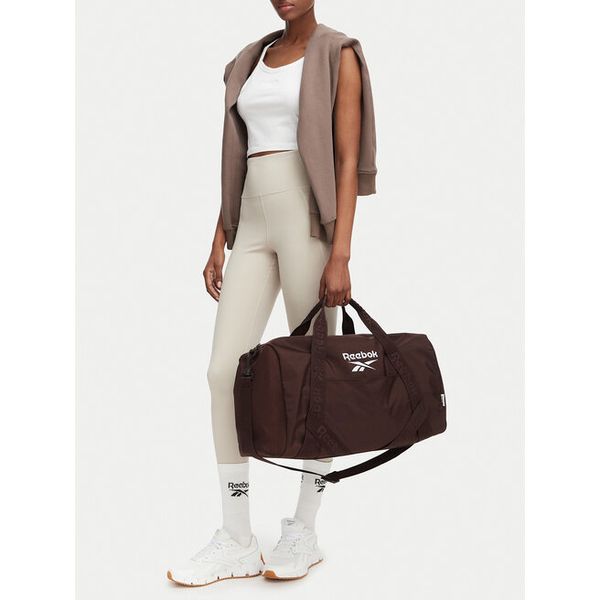 Torba sportowa Reebok. Brązowe torby podróżne i sportowe Reebok, bez wzorów. Za 129,99 zł.