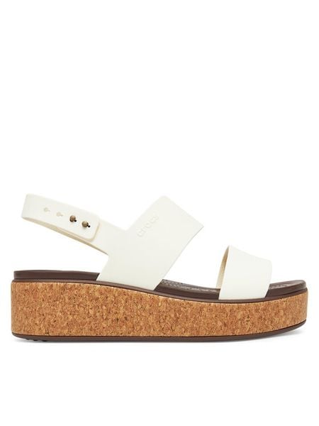 Crocs Sandały Brooklyn Cork Low Wedge 211144 Écru. Białe sandały Crocs, bez wzorów, z tworzywa sztucznego, bez obcasa, na płaskiej podeszwie, bez zapięcia. Za 226,99 zł.