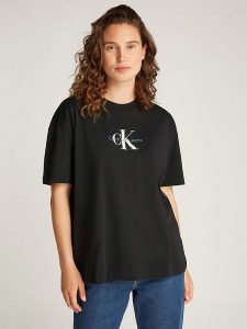 CALVIN KLEIN JEANS Koszulka w kolorze czarnym rozmiar: M. Czarne bluzki Calvin Klein Jeans, m, bez wzorów, z bawełny, bez kołnierzyka, bez ramiączek. Za 100,99 zł.