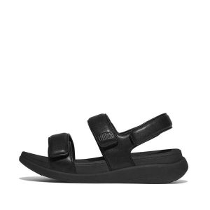 Klapki na koturnie z regulowanym paskiem na plecach damskie FitFlop F-Mode Go. Czarne klapki FIT FLOP, bez wzorów, bez obcasa, na koturnie. Za 489,50 zł.