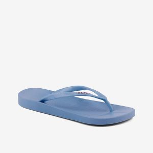 Damskie klapki Coqui. Niebieskie klapki Coqui, bez wzorów, z materiału, bez obcasa. Za 130,99 zł.