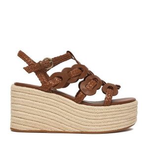 Sandały Badura. Brązowe sandały Badura, bez wzorów, bez obcasa, bez zapięcia. Za 379,99 zł.