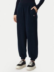 Tommy Jeans Spodnie dresowe Badge DW0DW23536 Granatowy Regular Fit. Niebieskie spodnie dresowe Tommy Jeans, xxs, bez wzorów, z bawełny. Za 329,99 zł.