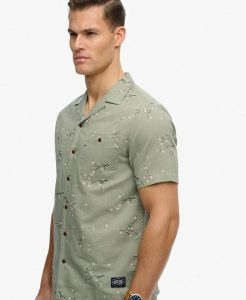Superdry Krótka koszula plażowa z nadrukiem bawełna-len. Zielone koszule Superdry, xl, bez wzorów, z bawełny, bez kołnierzyka, bez ramiączek. Za 301,95 zł.