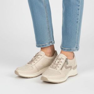 Sneakersy damskie Rieker, cholewka perforowana sznurowanie zamek z boku wzmocniony nosek niski profil kontrastowe wstawki miękka wyściółka stabilna k. Brązowe czółenka Rieker, bez wzorów, z jeansu, bez obcasa, na koturnie, bez zapięcia. Za 332,90 zł.