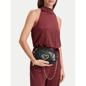 Torebka Eva Minge. Czarne torebki wieczorowe Eva Minge, bez wzorów, bez dodatków. Za 229,99 zł.