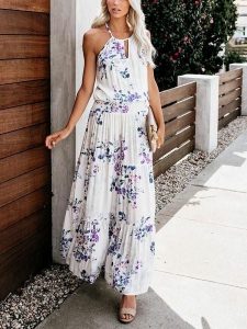 Milan Kiss Sukienka w kolorze biało-fioletowym rozmiar: XL. Białe sukienki Milan Kiss, xl, bez wzorów, sportowe, bez kołnierzyka, bez ramiączek, maxi, rozkloszowane. Za 173,99 zł.