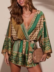 Milan Kiss Kombinezon w kolorze zielono-beżowym rozmiar: L. Brązowe kombinezony Milan Kiss, l, bez wzorów, z tkaniny, bez kołnierzyka, bez ramiączek. Za 195,77 zł.