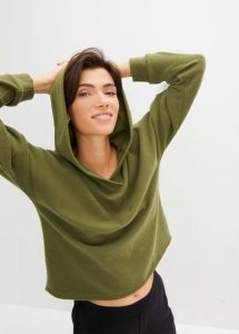 Bluza z materiału w optyce dzianiny. Zielone bluzy bonprix, bez wzorów, z dzianiny, z kapturem. Za 139,99 zł.