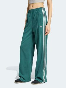 Adidas Spodnie dresowe w kolorze morskim rozmiar: XS. Zielone spodnie dresowe ADIDAS, xs, bez wzorów, z dresówki. Za 234,95 zł.