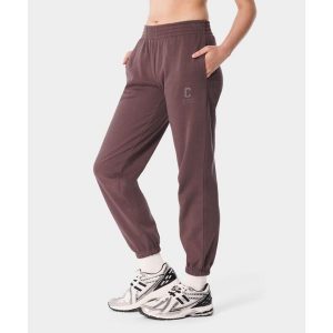 Spodnie dresowe sportowe dla kobiet Carpatree Varsity Chic. Brązowe spodnie dresowe Carpatree, bez wzorów, z dresówki, na fitness i siłownię. W wyprzedaży za 212,49 zł.