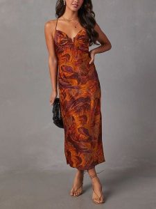 Milan Kiss Sukienka w kolorze pomarańczowo-jasnobrązowym rozmiar: L. Brązowe sukienki Milan Kiss, na co dzień, l, bez wzorów, bez kołnierzyka, bez ramiączek, maxi, proste. Za 165,99 zł.