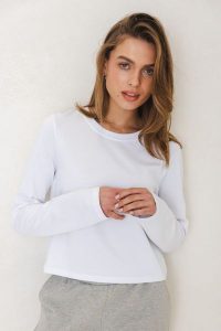 BLUZKA PENNY BIAŁA L - Flawless. Białe bluzki Flawless, l, bez wzorów, z bawełny, klasyczne, bez kołnierzyka, bez ramiączek. Za 189,00 zł.