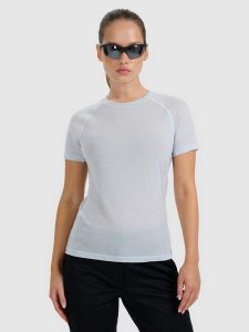 4F Koszulka trekkingowa z wełną merino damska - niebieska XL. Niebieskie bluzki 4f, s, bez wzorów, z wełny, bez kołnierzyka, bez ramiączek. W wyprzedaży za 169,99 zł.