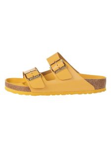 Birkenstock Skórzane klapki w kolorze żółtym rozmiar: 37. Żółte klapki Birkenstock, bez wzorów, z otwartym noskiem, bez obcasa. Za 454,95 zł.