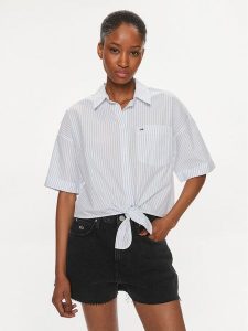 Tommy Jeans Koszula DW0DW17809 Błękitny Relaxed Fit. Niebieskie koszule Tommy Jeans, s, bez wzorów, z bawełny, bez kołnierzyka, bez ramiączek. Za 349,00 zł.