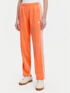 Adidas Spodnie dresowe adicolor Classics Firebird JC8286 Pomarańczowy Regular Fit. Brązowe spodnie dresowe ADIDAS, m, bez wzorów, z dresówki. Za 179,99 zł.