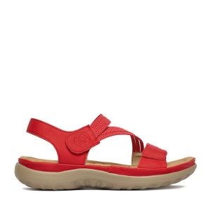 Sandały Rieker. Czerwone sandały Rieker, bez wzorów, bez obcasa, na płaskiej podeszwie, bez zapięcia. Za 319,99 zł.