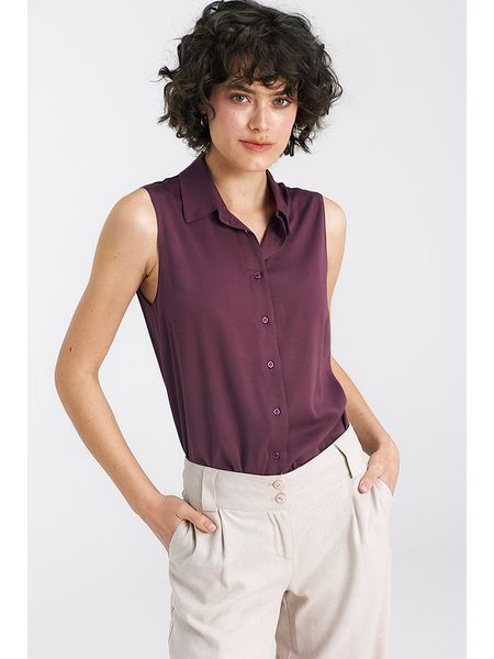 Nife Bluzka w kolorze ciemnofioletowym rozmiar: 40. Różowe bluzki Nife, bez wzorów, z wiskozy, bez kołnierzyka, bez ramiączek. Za 109,00 zł.