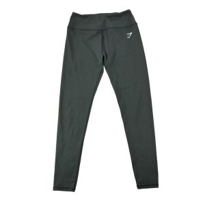 Second life - Legginsy damskie do jogi Gymshark - Jak nowy. Czarne legginsy Gymshark, bez wzorów, z materiału, z obniżonym stanem. Za 85,16 zł.
