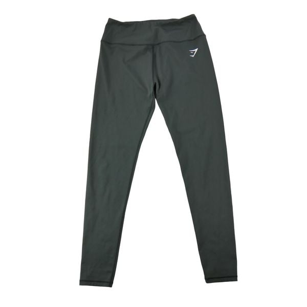 Second life - Legginsy damskie do jogi Gymshark - Jak nowy. Czarne legginsy Gymshark, bez wzorów, z materiału, z obniżonym stanem. Za 85,16 zł.