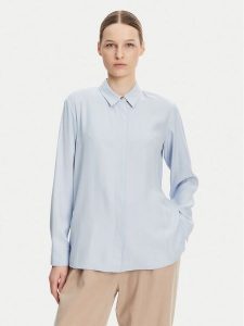 Tommy Hilfiger Koszula WW0WW44045 Błękitny Relaxed Fit. Niebieskie koszule TOMMY HILFIGER, bez wzorów, z wiskozy, bez kołnierzyka, bez ramiączek. Za 259,99 zł.