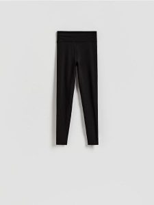 Gładkie legginsy - czarny. Czarne legginsy Reserved, bez wzorów, z dzianiny. Za 89,99 zł.