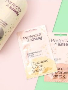 Balsam do ciała Sinsay x Perfecta - złoty. Żółte body i gorsety Sinsay, bez wzorów. W wyprzedaży za 2,49 zł.