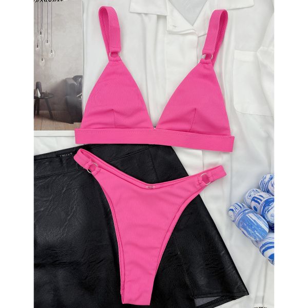 Strój kąpielowy z kółeczkami i regulowanymi ramiączkami na plażę i basen Shouko. Niebieskie stroje jednoczęściowe Intica, bez wzorów. Za 129,00 zł.