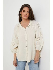 Rodier Lin Lniana bluzka w kolorze kremowym rozmiar: M/L. Brązowe bluzki Rodier Lin, l, bez wzorów, z koronki, bez kołnierzyka, bez ramiączek. Za 145,60 zł.