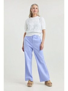 Josephine & Co Spodnie "Jelmer" w kolorze błękitnym rozmiar: 36. Niebieskie spodnie z wysokim stanem Josephine & Co, bez wzorów, z materiału, z podwyższonym stanem. Za 260,99 zł.