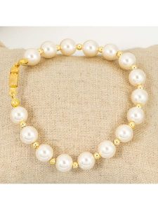 MENTHE À L'O Pozłacana bransoletka rozmiar: onesize. Żółte bransoletki MENTHE À L'O, z perłą, pozłacane. Za 78,28 zł.