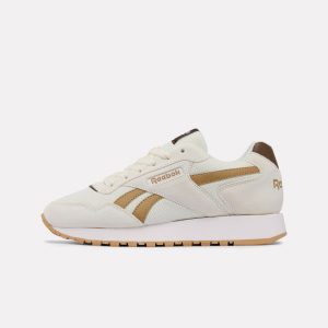 Sneakersy damskie Reebok Glide. Białe buty sportowe Reebok, bez wzorów, bez zapięcia. Za 269,99 zł.