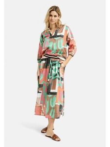 Milano Italy Bluzka ze wzorem rozmiar: 44. Bluzki Milano Italy, bez wzorów, z bawełny, bez kołnierzyka, bez ramiączek. Za 173,99 zł.