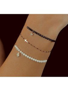 Les Petites Précieuses Pozłacana bransoletka z cyrkoniami rozmiar: onesize. Czarne bransoletki Les Petites Précieuses, z cyrkonią, pozłacane. Za 78,95 zł.